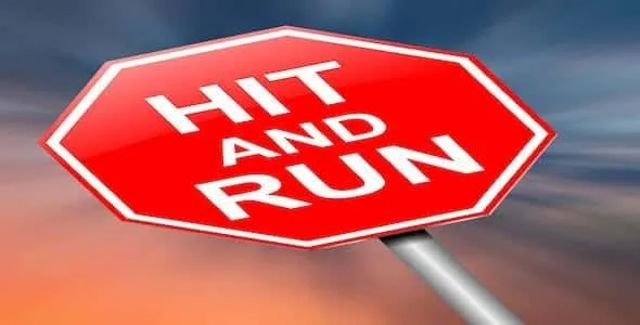 A red stop sign reads "HIT AND RUN" against a blurred sky, highlighting the crucial do's and don'ts of such an incident.