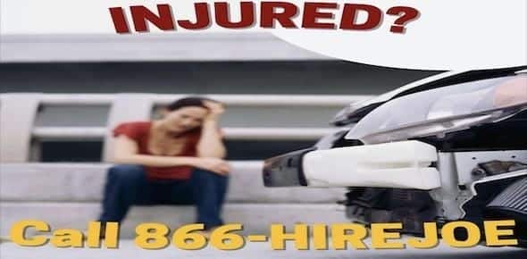 Text reads "INJURED? Call 866-HIREJOE" with an image of a distressed person sitting near a damaged car. Turn to our expert Car Accident Lawyers for help navigating your recovery and claim.
