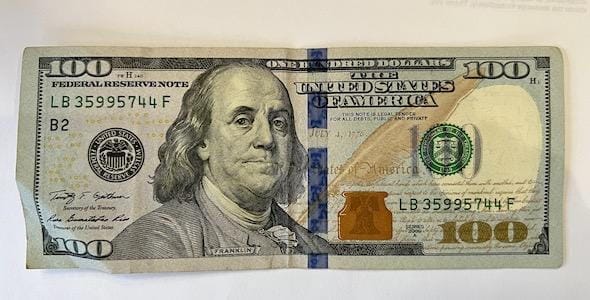 The US one hundred dollar bill featuring Benjamin Franklin reminds us of the significant insurance company benefits that can provide peace of mind, whether facing a car accident or dealing with other financial challenges.